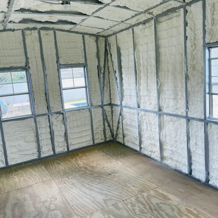 Closed-cell spray foam insulation applied to wall cavities in a residential project in London