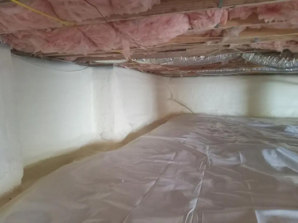 Crawl space encapsulation with closed-cell spray foam for Roof Waterproofing in London